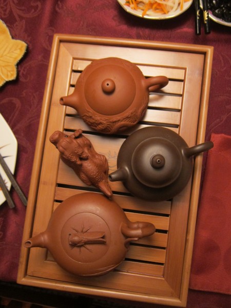 Three yixing teapots for three kinds of tea.  We started off with Buddha's Hand and Tung Ting Cold Summit, then finished with Medium Roast Tieguanyin. The Tung Ting was surprisingly long-lasting even after the fifth infusion.  