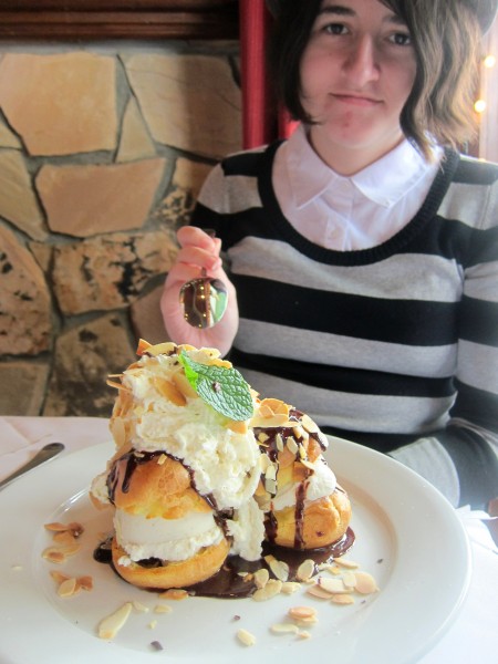 Sidney and the cream puffs. See how big this dessert is?