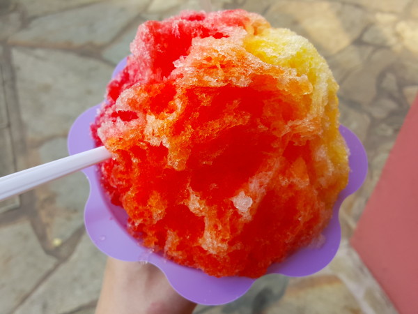Shave ice with 3 flavors: pineapple, cherry, and P.O.G. (passion fruit, orange, guava). Photo by bnibroc. 